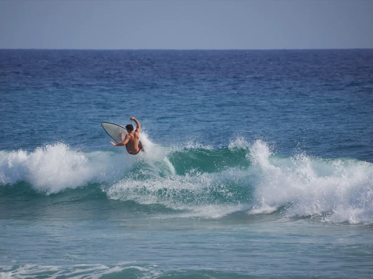 Phuket in July — green hills and surfing at Kata Beach